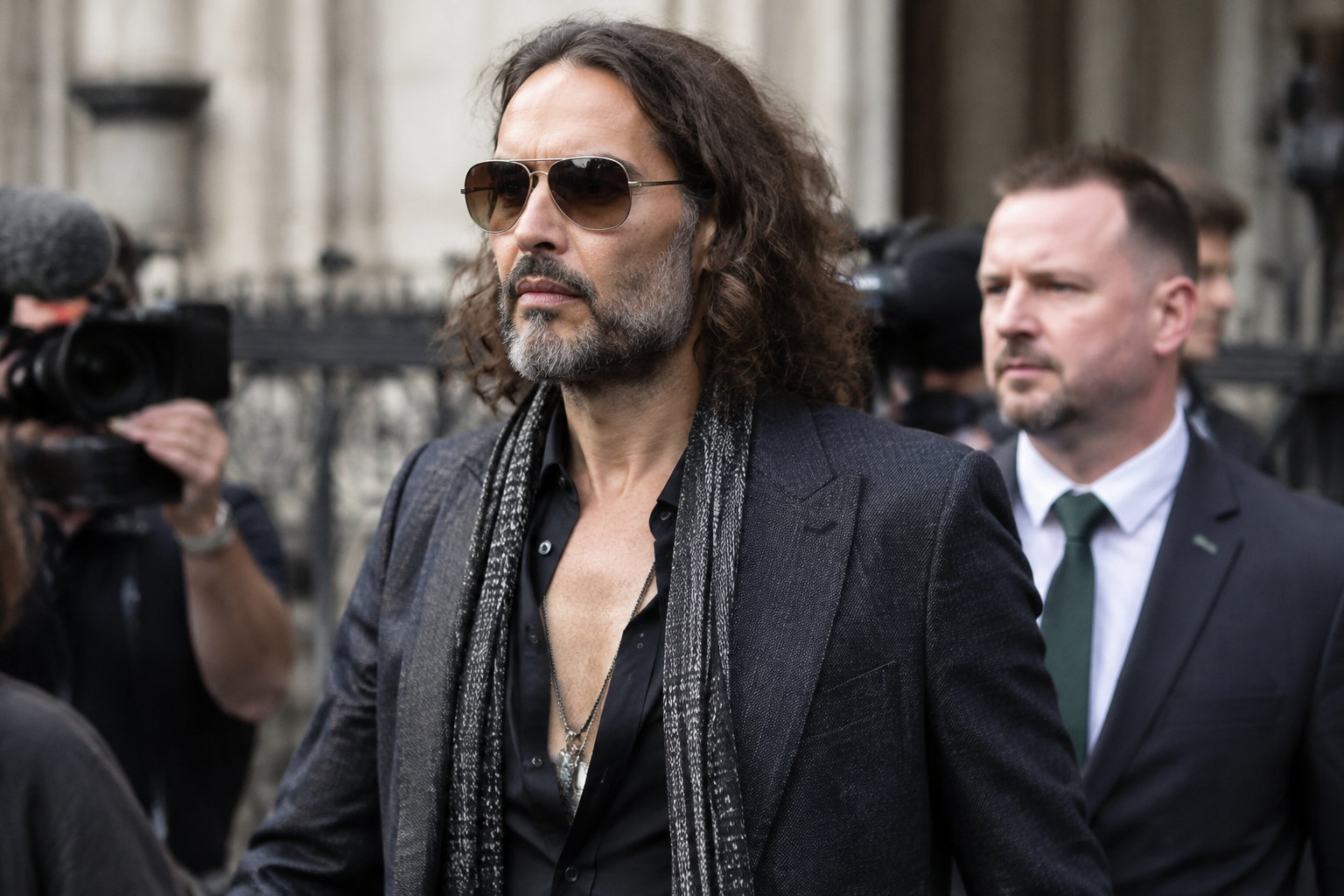 Russell Brand accuser says she feared pregnancy after alleged rape