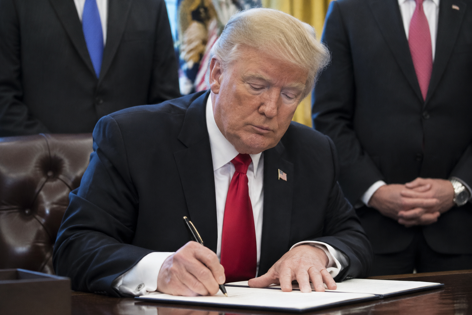 Trump Signs Order Exempting Russia From Sanctions Law