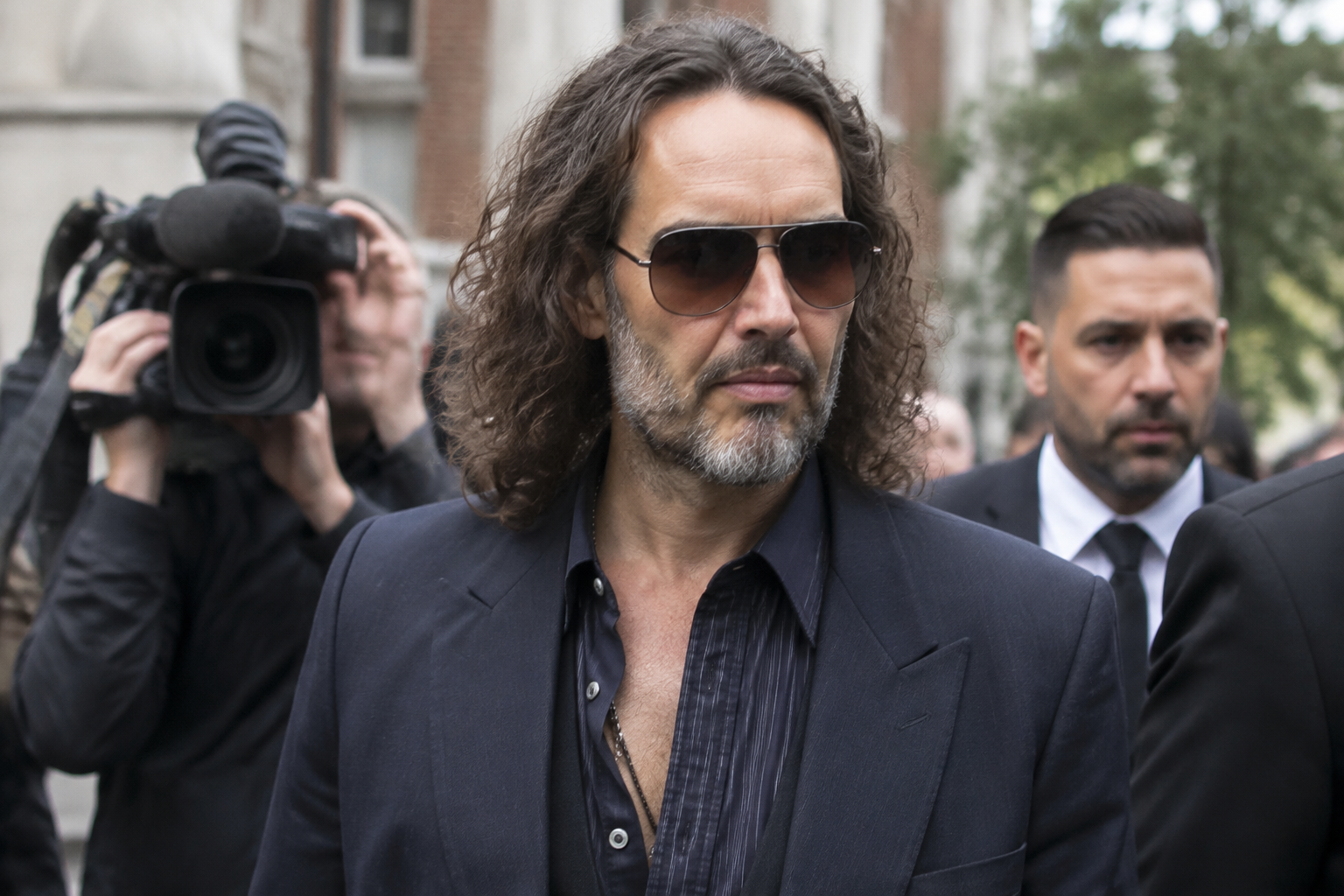 Russell Brand accuser's friend tells court of alleged aggression and pain