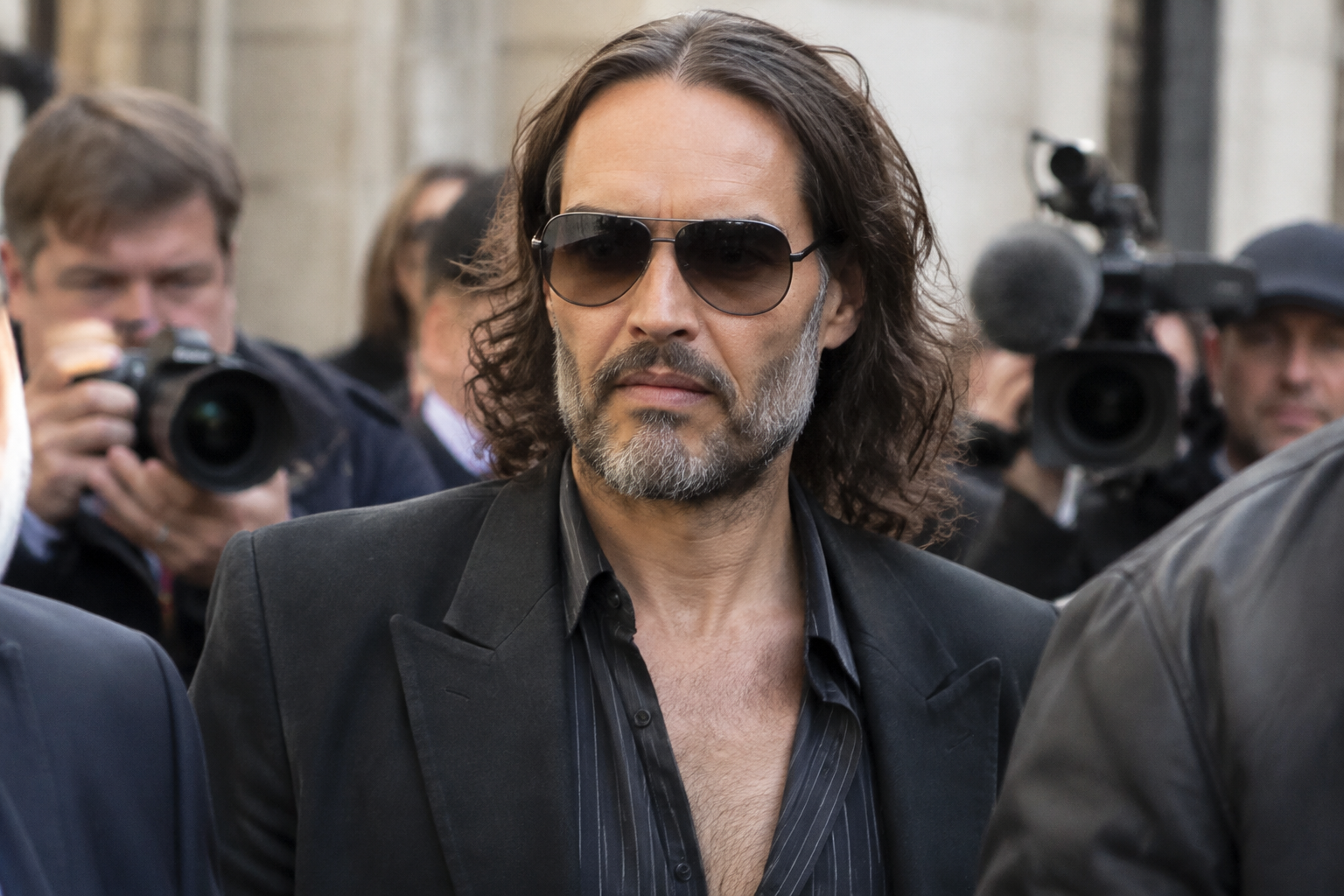 Russell Brand asked assistant for female fans’ phone numbers, court told